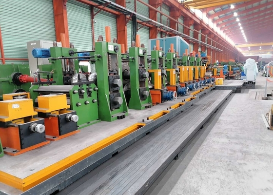 ERW Steel Pipe Production Line The Steel Belt Feeding Unit, Through The Roll Bring Curled Up Into A Tube Billet Steel